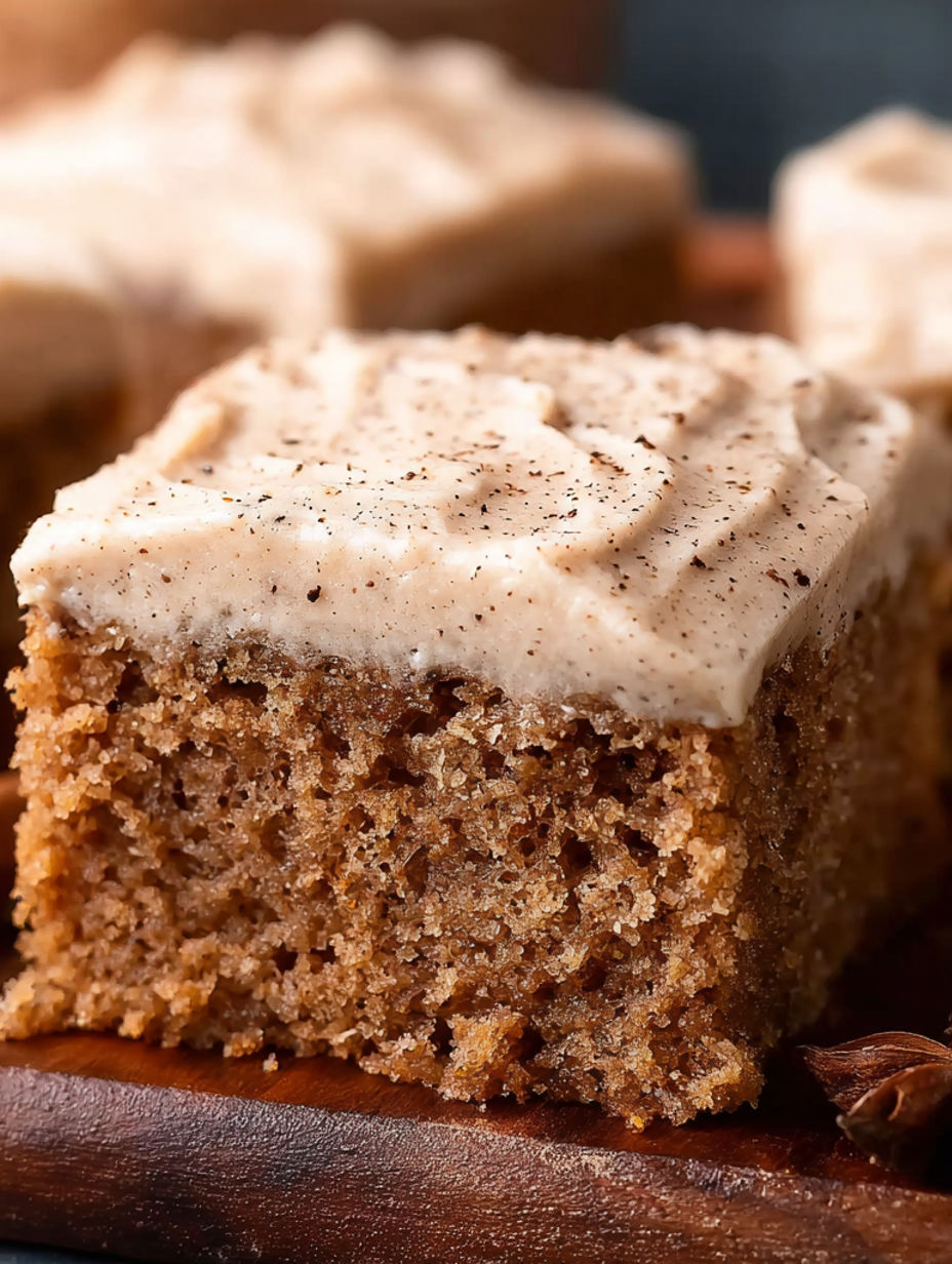 A slice of chai cake with a chai milk soak.