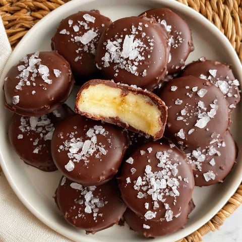A plate of frozen chocolate banana bites.