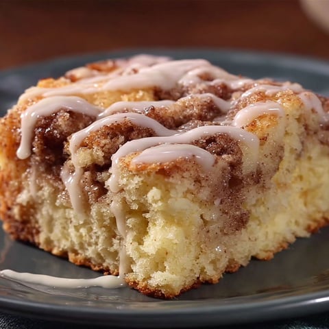 A slice of Cinnabon Cinnamon Roll Cake.