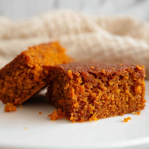 A slice of flourless oatmeal carrot cake.