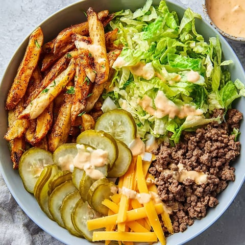 A bowl of food with a variety of ingredients.