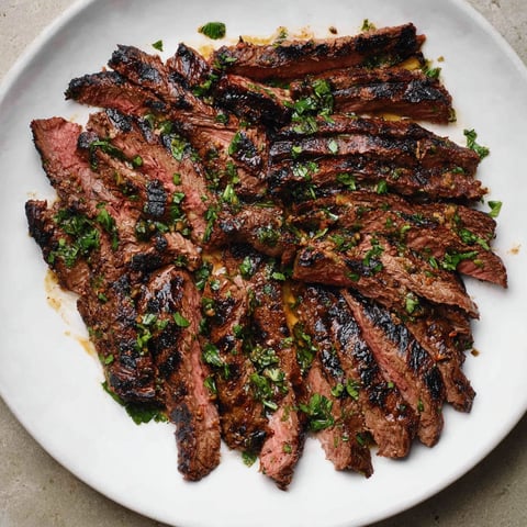 A plate of marinated skirt steak.