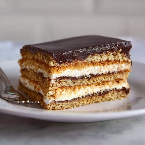 A slice of chocolate cake on a plate.