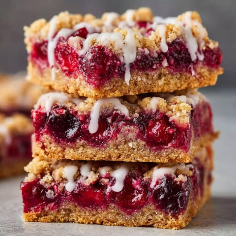 Three slices of cherry pie bars.
